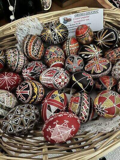 Colorful decorative Easter eggs in basket