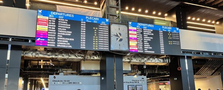Departure board at Bucharest airport terminal