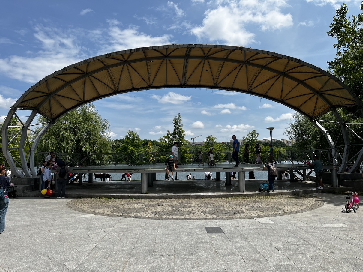 Open-air amphitheatre stage on the lake edge at IOR Park, Bucharest