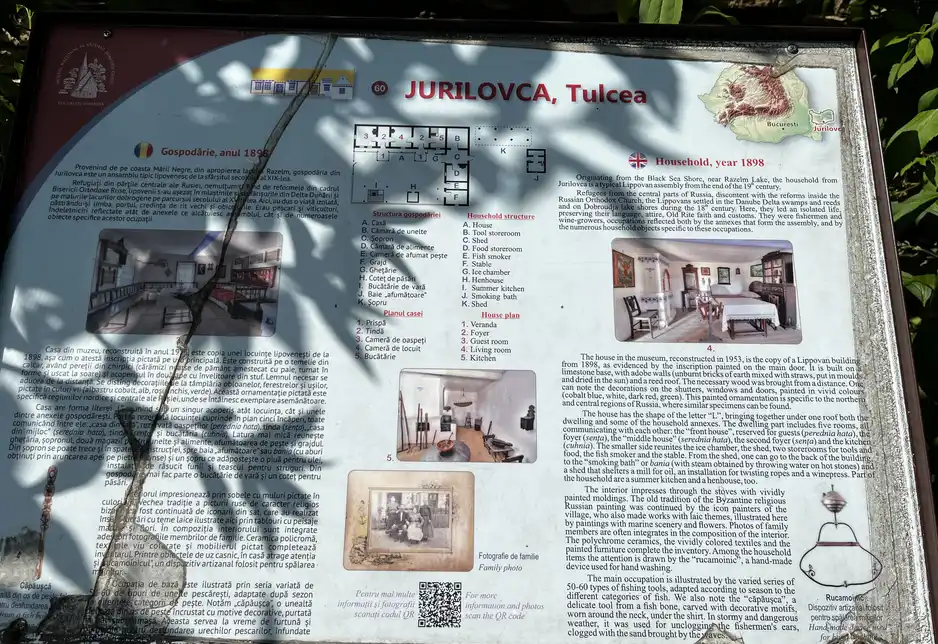 Information panel for the Jurilovca household, with its fishing-related outbuildings.