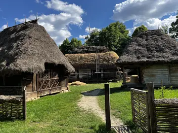 Traditional household buildings arranged around an open courtyard.