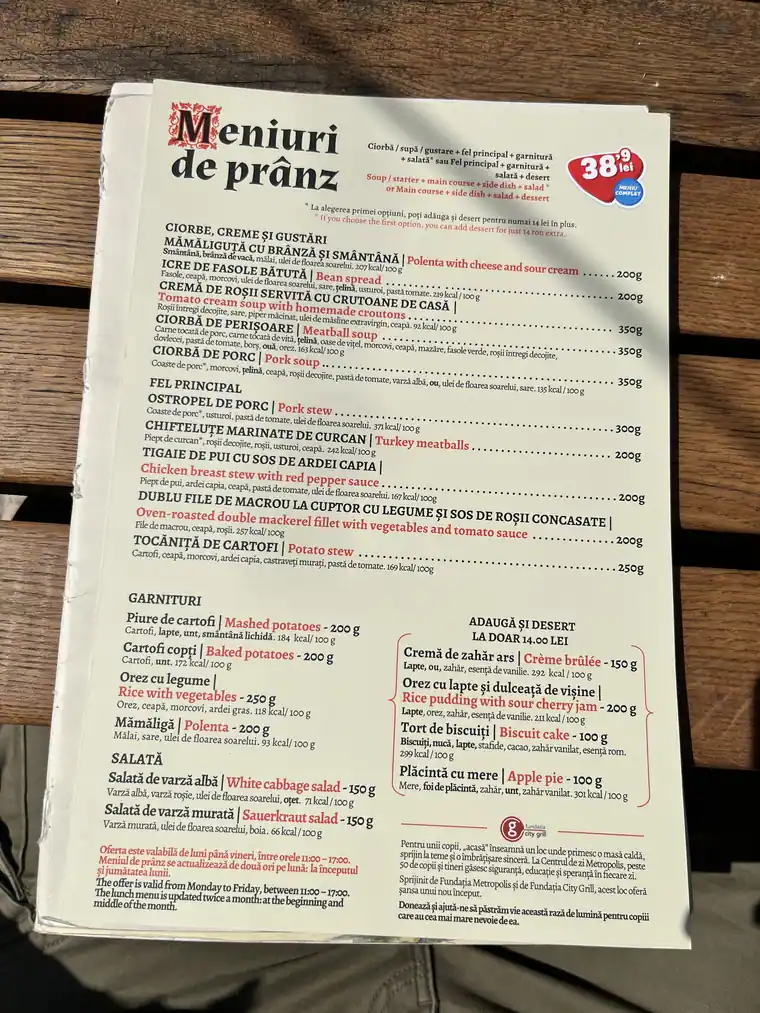 Printed Hanu’ lui Manuc weekday lunch menu photographed in April 2026, showing the 38.9 lei offer and dishes.
