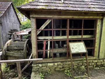 Waterwheel and wooden workings of a traditional mill.