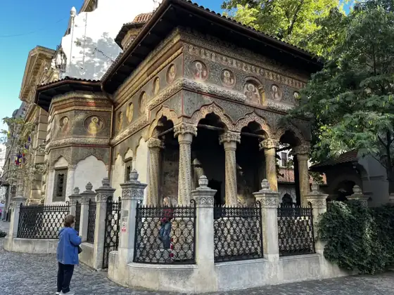 Stavropoleos Church and its carved entrance porch in Bucharest Old Town.
