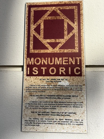 Historic monument plaque describing Casa Mița Biciclista and its 1911 extension