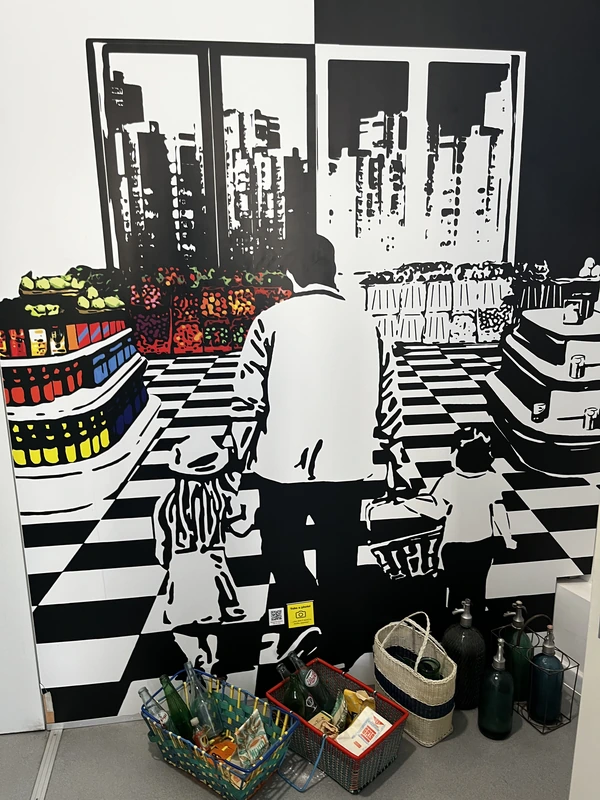 Illustration of an empty grocery shop behind baskets, bottles and vintage food packaging.