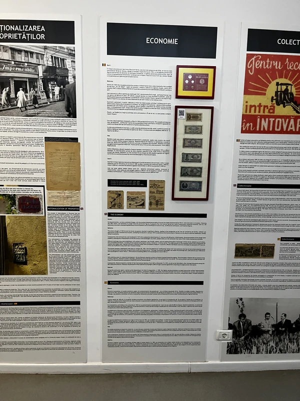 Museum panels about nationalization, the economy and collectivization.