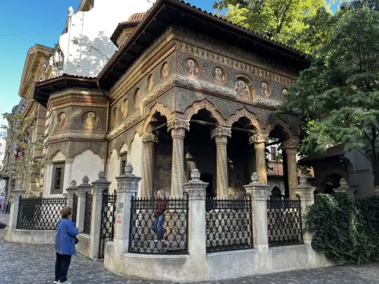 Stavropoleos Church and its carved entrance porch in Bucharest Old Town.