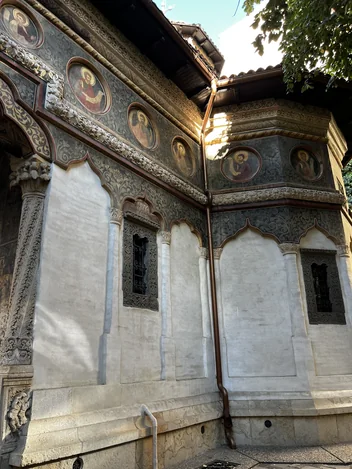 Painted saints’ medallions on the side of Stavropoleos Church.