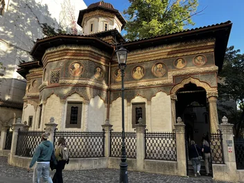 Stavropoleos Church seen from the cobbled street outside.